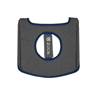 Dark gray zuca cart reversible seat cushion with blue trim, a circular cut-out, and a zuca logo strap.