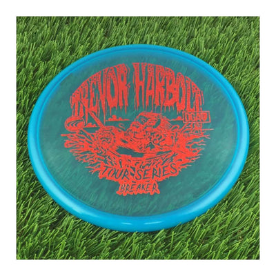 Translucent blue DGA Ice Breaker disc golf putter with a vibrant red Trevor Harbolt Tour Series stamp.