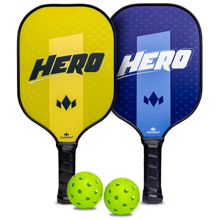 Diadem Hero V2 pickleball paddle set with one yellow and one blue paddle, plus two lime green pickleballs.