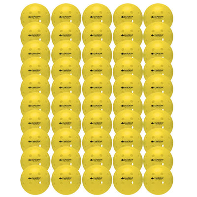 A multitude of bright yellow Diadem Official pickleballs are tightly grouped together, showcasing their even hole patterns.