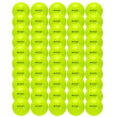 Fifty vivid neon yellow Diadem Official pickleballs with small visible holes are neatly arranged in rows.