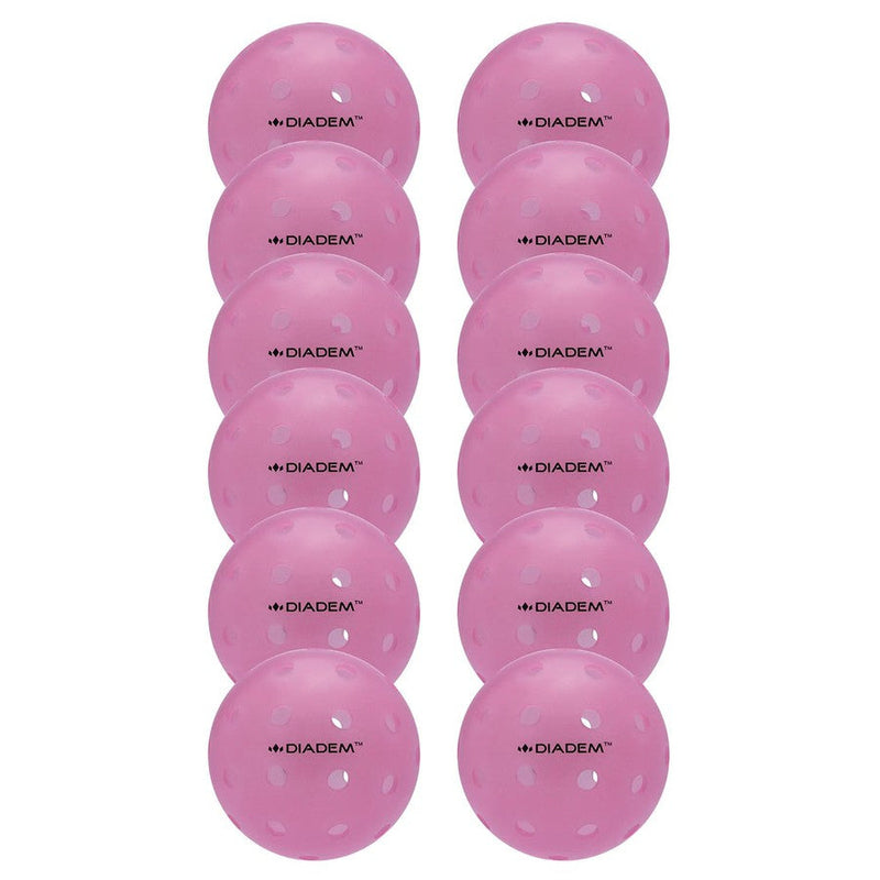 Twelve pink Diadem Power Pickleballs, each with multiple holes and the brand logo, are arranged in two columns.