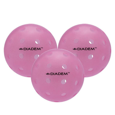 Three bright pink Diadem Power Pickleballs, each featuring multiple circular holes and the company logo in black text.