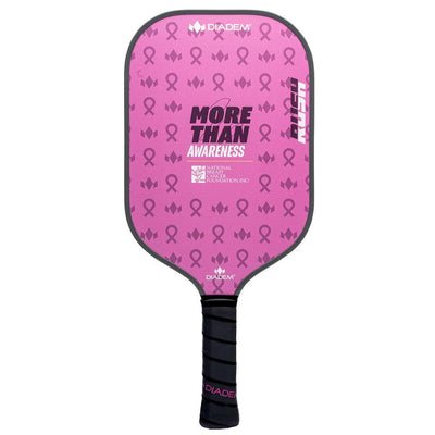 Pink Diadem Rush pickleball paddle featuring a "More Than Awareness" graphic and repeated pink ribbons, with a black grip.