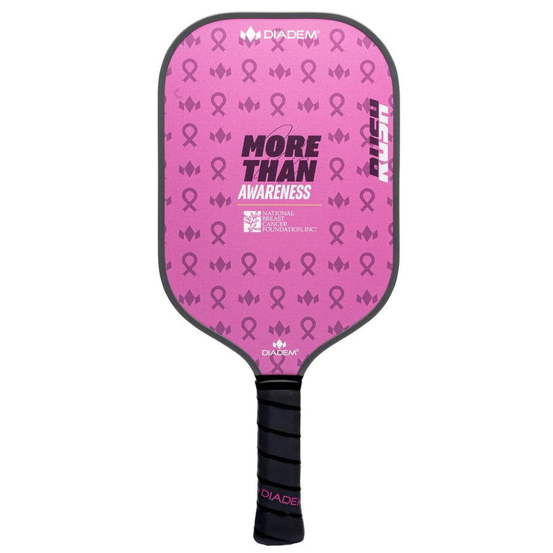 Pink Diadem Rush pickleball paddle featuring a "More Than Awareness" graphic and repeated pink ribbons, with a black grip.
