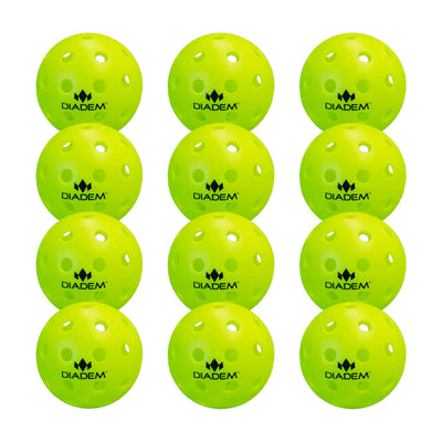 Twelve yellow-green Diadem outdoor training pickleballs with circular holes and black logos.