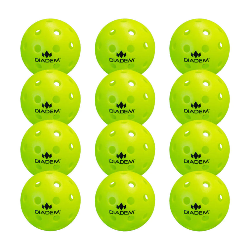 Twelve yellow-green Diadem outdoor training pickleballs with circular holes and black logos.