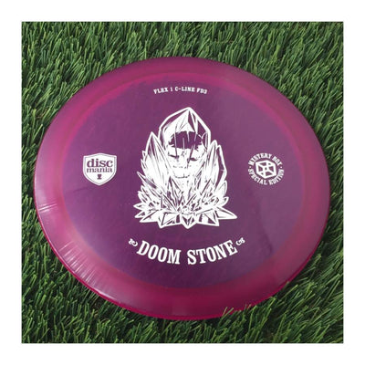 Translucent purple Discmania Flex 1 C-Line FD3 disc golf disc with a white Doom Stone skull design.