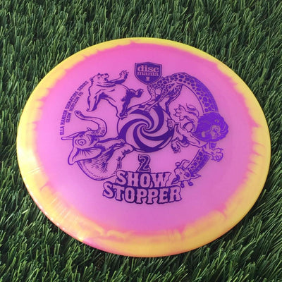 Discmania Horizon C-Line Color Glow FD in solid pink with a yellow rim and purple Ella Hansen "Show Stopper 2" stamp.