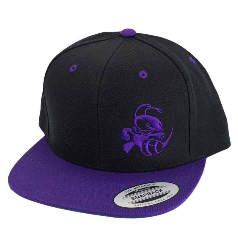 Black snapback hat with a flat purple bill, featuring a purple Discraft Buzz embroidered logo.