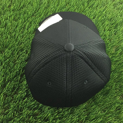 Black Discraft Buzz embroidered logo mesh back Flexfit hat with a curved bill and fabric front panels.