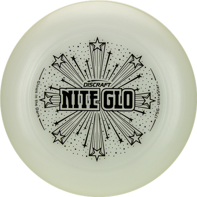 Creamy white Discraft Ultra-Star Nite Glo disc with a black bursting star design and "NITE GLO" text.