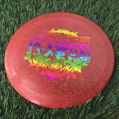 Discraft Cryztal Sparkle translucent red disc golf distance driver with a colorful roses and thorns Oregon 3X PDX stamp.