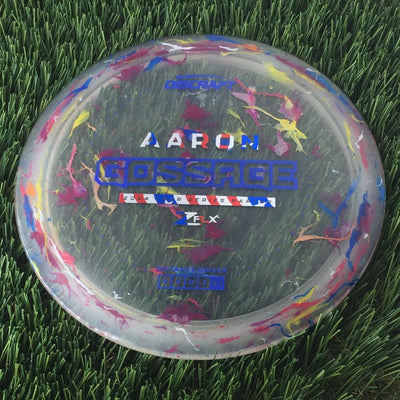 Translucent off-purple Discraft Jawbreaker Z FLX Raptor with colorful specks and a blue Aaron Gossage 2024 Tour Series stamp.