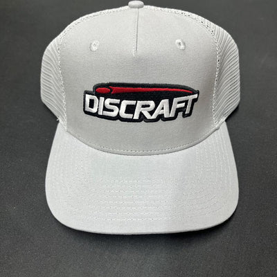 Light gray New Era Discraft embroidered logo mesh snapback hat with a curved bill and stitched eyelets.