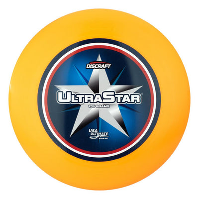Orange Discraft Ultra-Star Ultimate disc with a blue and white center print featuring a star and patriotic details.