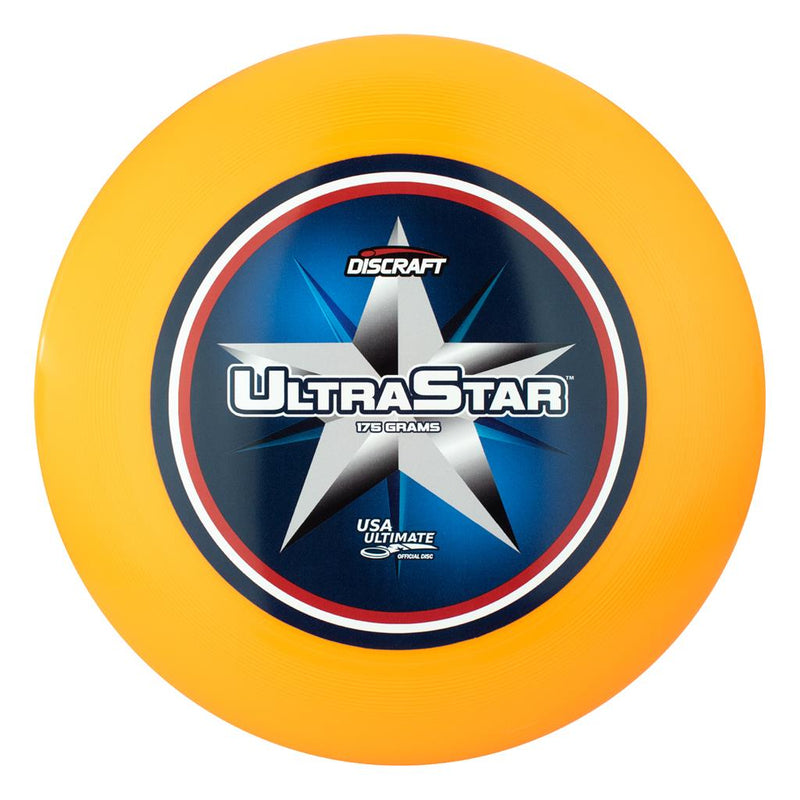 Orange Discraft Ultra-Star Ultimate disc with a blue and white center print featuring a star and patriotic details.