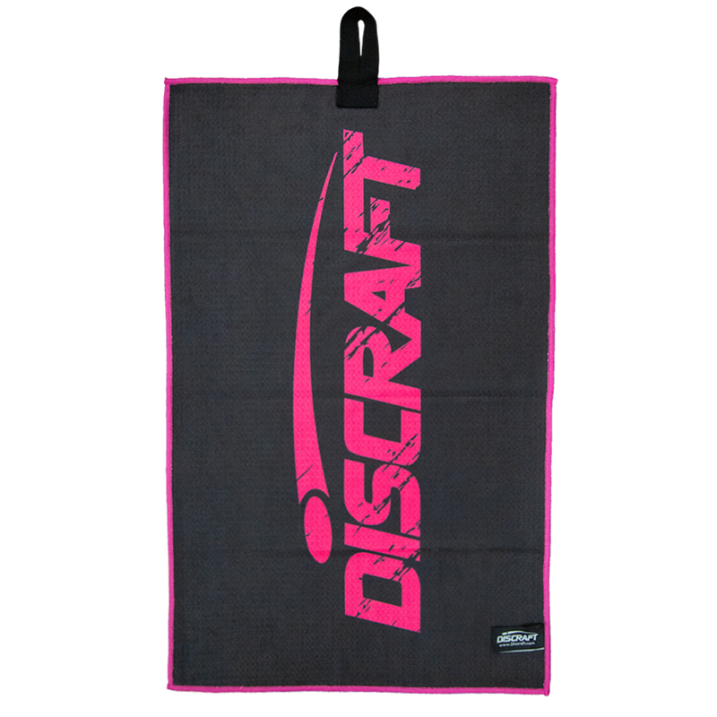 Black Discraft Paige Pierce microfiber towel with a large vertical hot pink Discraft logo and pink trim.