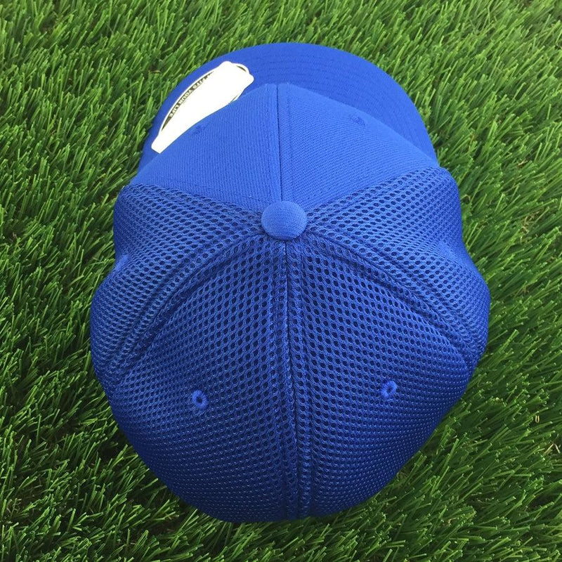 Royal blue Flexfit cap with a solid front, contrasting mesh back panels, and a rounded top button.