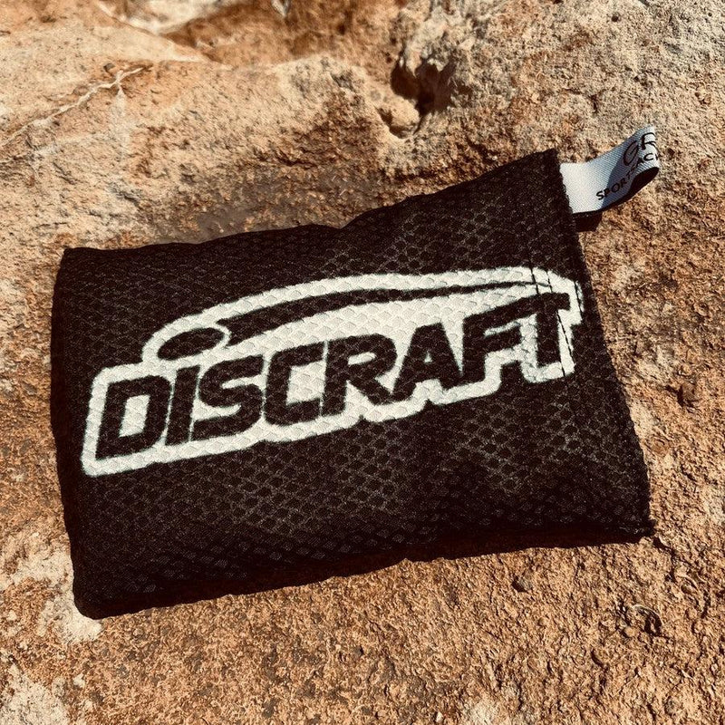 Black Discraft Silky Feel Waffle Sportsack with a white logo and small loop on the corner.