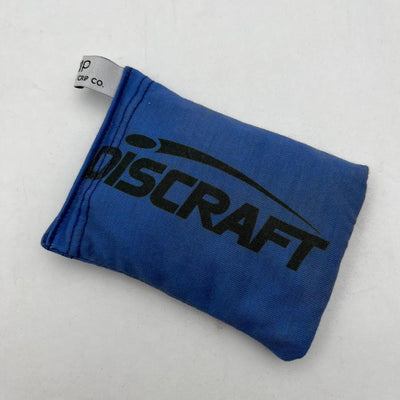 Royal blue Discraft Sportsack with a prominent black Discraft logo across the center, featuring a small white tag.