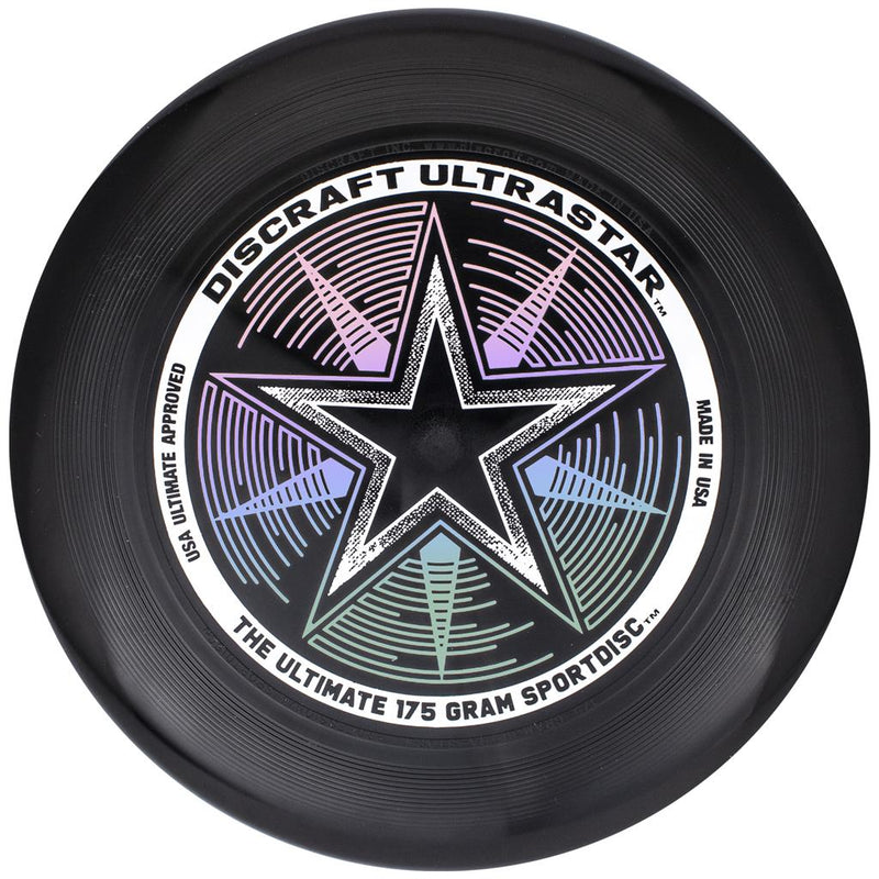 Black Discraft Ultra-Star Ultimate Frisbee with a purple, blue, and green star graphic in the center.