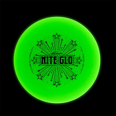 Bright green Discraft UltraStar Nite Glo ultimate frisbee with radiating stars and bold black lettering.