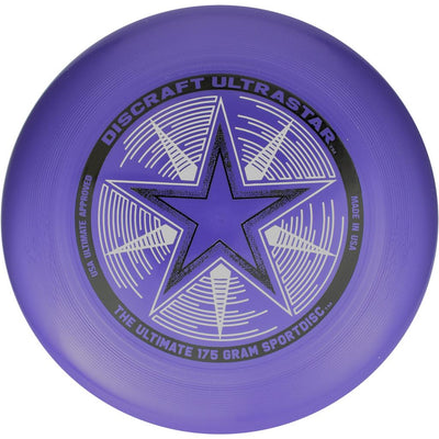 Purple Discraft Ultrastar frisbee with a black star in the center and white text surrounding it.