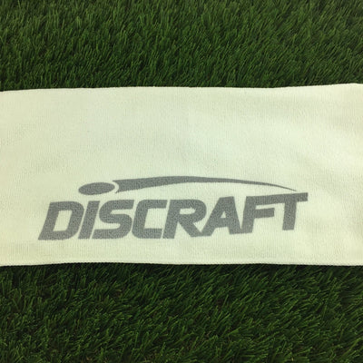 White microfiber towel with a gray Discraft logo printed prominently in the center.