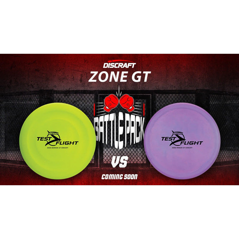 Lime green and purple Discraft Zone GT disc golf discs with "Test Flight" branding are shown.