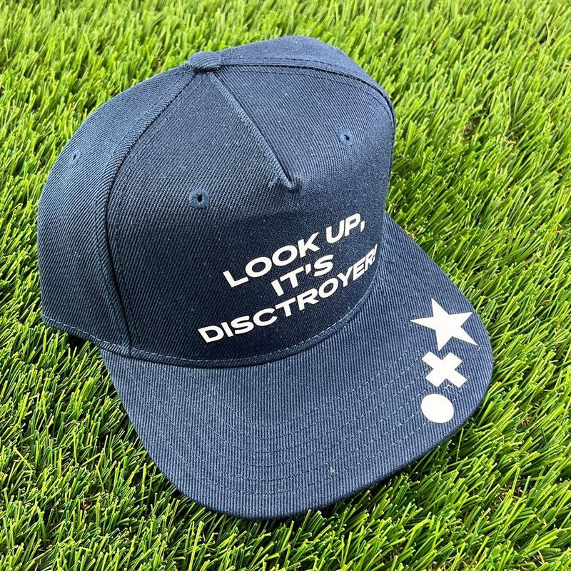 Navy blue Disctroyer flat bill snapback hat with "LOOK UP, IT&