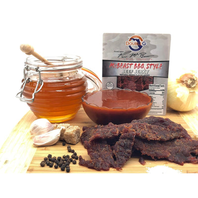 DoubleG Paul McBeth McBeast BBQ Style beef jerky packaging with a piece of brown dried jerky.