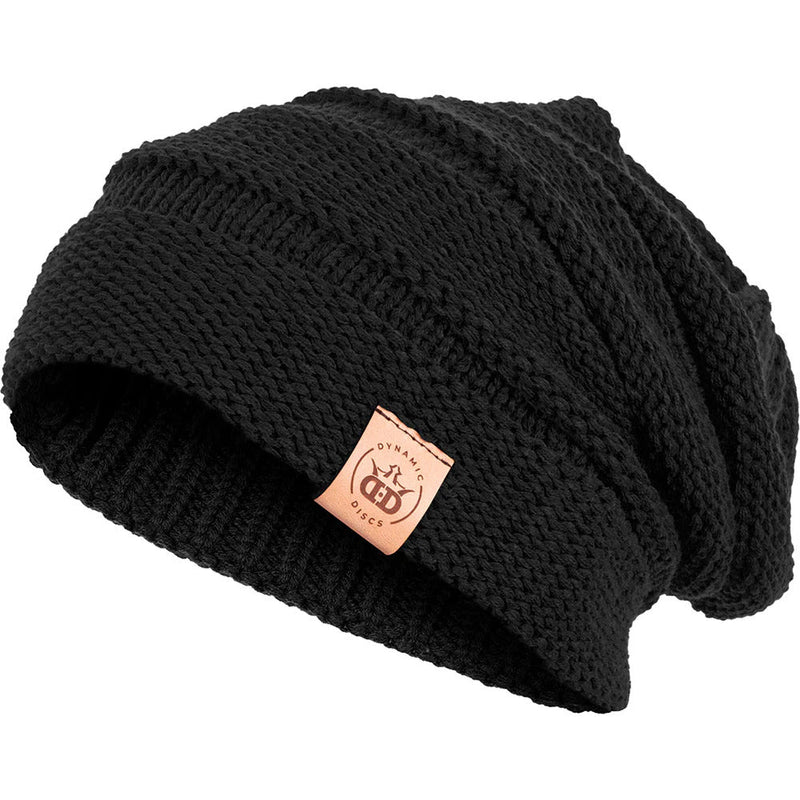 Black Dynamic Discs Deluxe Slouch Scrunch Beanie in a chunky knit texture with a brown leatherette brand tag.