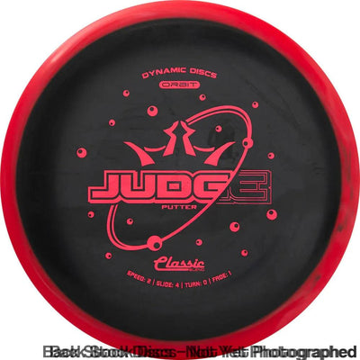 Dynamic Discs Classic Blend Orbit Judge putter with a black flight plate, red rim, and red Orbit Judge stamp.