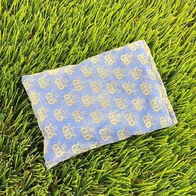 Dynamic Discs Dirtbag Mini King DS blue pouch with a repeated yellow crown motif.
