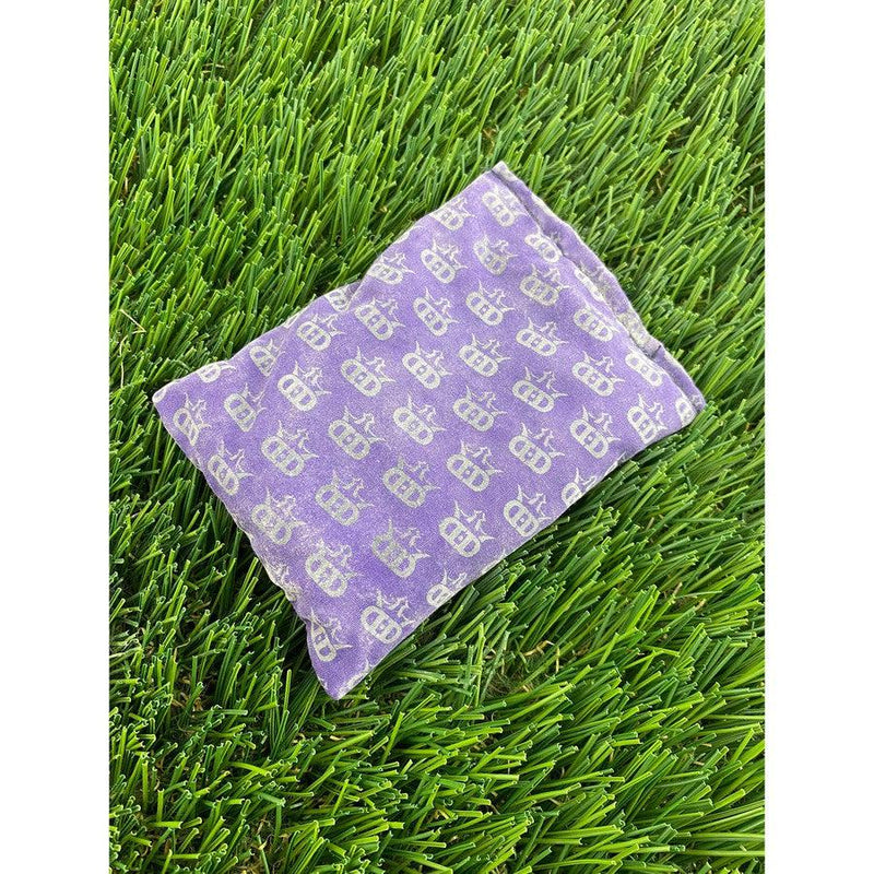 Purple Dynamic Discs Dirtbag Mini King DS disc golf towel with a silver crown and beetle pattern.