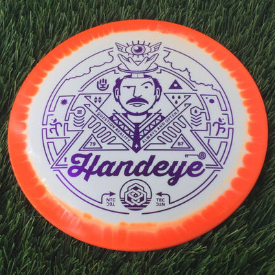 Orange and white Dynamic Discs Fuzion Ice Orbit Vandal, 176g, with a purple Handeye Supply Co Meditate stamp.