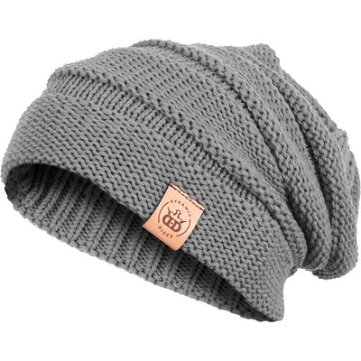 Gray knitted Dynamic Discs slouch beanie with a ribbed cuff and a small brown leather brand tag.