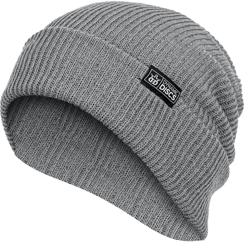 Gray ribbed knit Dynamic Discs Utility Slouch Beanie with a black and white brand logo patch on the cuff.