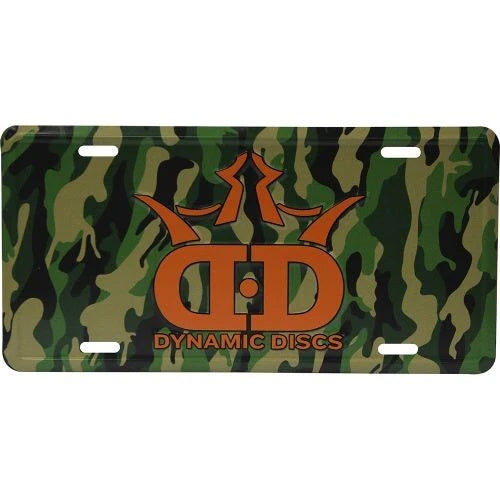 Dynamic discs license plate with a green, brown, and black camouflage pattern and orange "dd" logo.