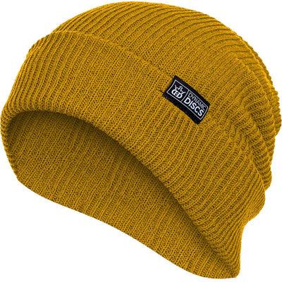 Mustard yellow Dynamic Discs utility slouch beanie with a ribbed knit texture and black woven label.