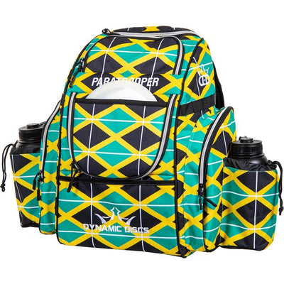 Dynamic Discs Paratrooper backpack in black, green, and yellow argyle pattern with two black water bottles.