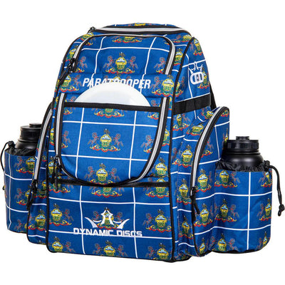 Blue Dynamic Discs Paratrooper backpack with a white grid pattern, colorful state seals, and two black water bottles.