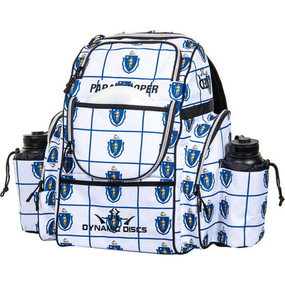 White Dynamic Discs Paratrooper disc golf bag with a blue state seal pattern and two black water bottles.