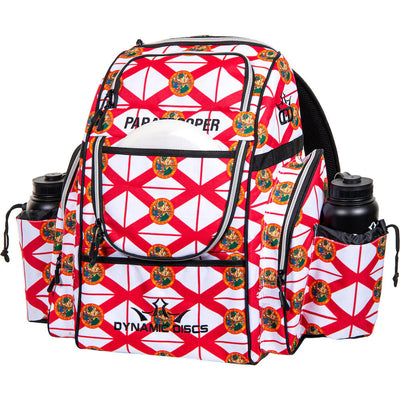 White and red Dynamic Discs Paratrooper disc golf bag with Florida flag pattern, zippers, and two black water bottles.