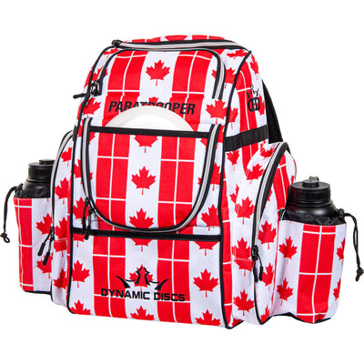 Dynamic Discs Paratrooper backpack disc golf bag in a red and white Canadian flag design with two black water bottles.