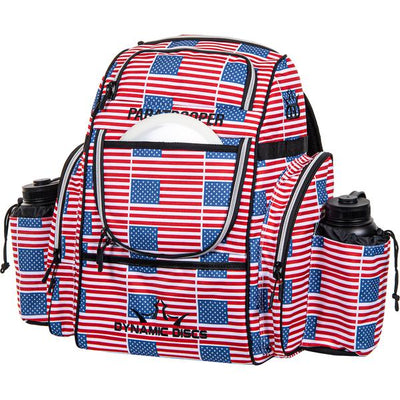 Dynamic Discs Paratrooper backpack adorned with a USA flag design, featuring black zippers and two water bottles.