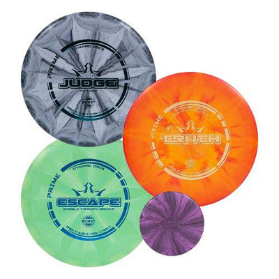 Four Dynamic Discs Prime Burst disc golf discs, featuring gray Judge, orange Truth, mint Escape, and a small purple disc.