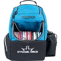 Blue and black Dynamic Discs Trooper backpack disc golf bag with an open disc compartment and full water bottle.