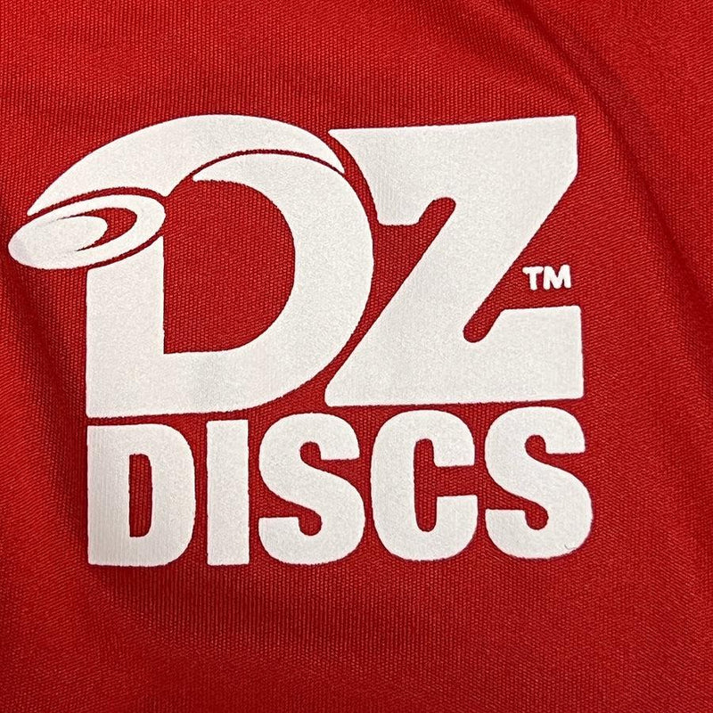 Red DZ DISCS A4 Dry-Fit Performance Shirt with the white DZ DISCS logo featuring stylized letters.